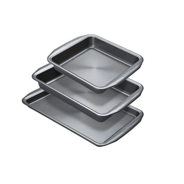 Set of three roasting trays; square and rectangle deep cake tin and shallow rectangular baking tray.