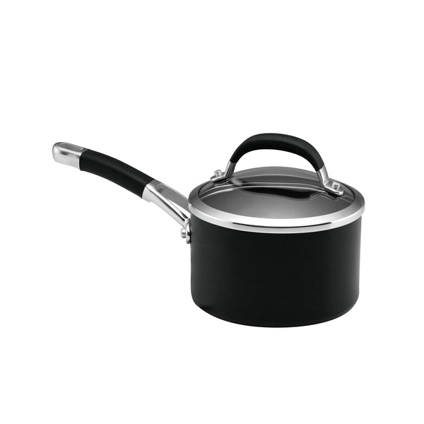 16cm black non-stick saucepan with glass lid on white background.