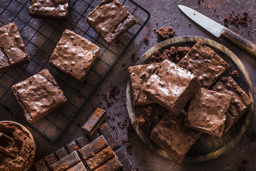 Chocolate brownies stacked attractively