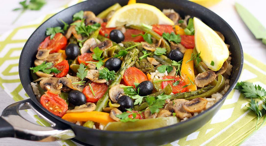 Mixed vegetable paella in a wok