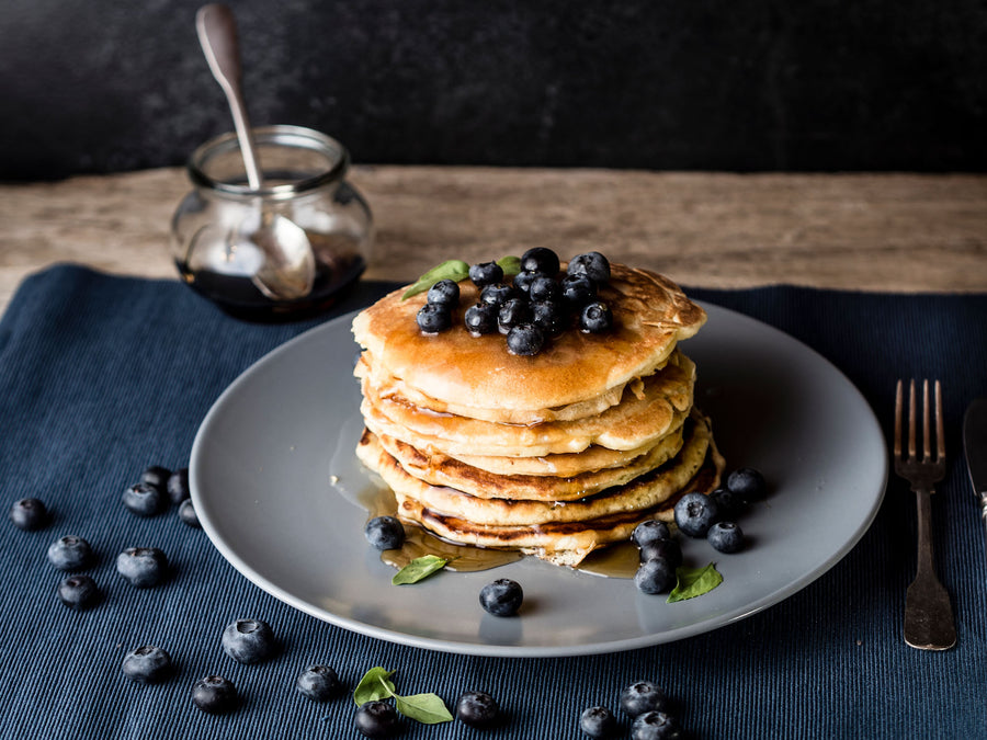 Pancakes topped with berries