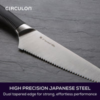 Close up of serrated blade on utility knife. Text reads: High precision Japanese steel with dual tapered edge for strong, effortless performance.