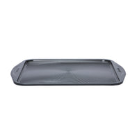 Side view of square non-stick baking tray