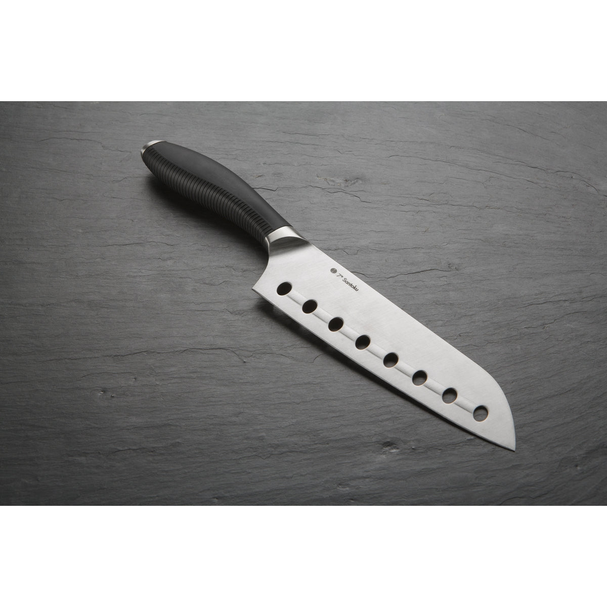 Product image of 7" Japanese Santoku Knife on a grey background.